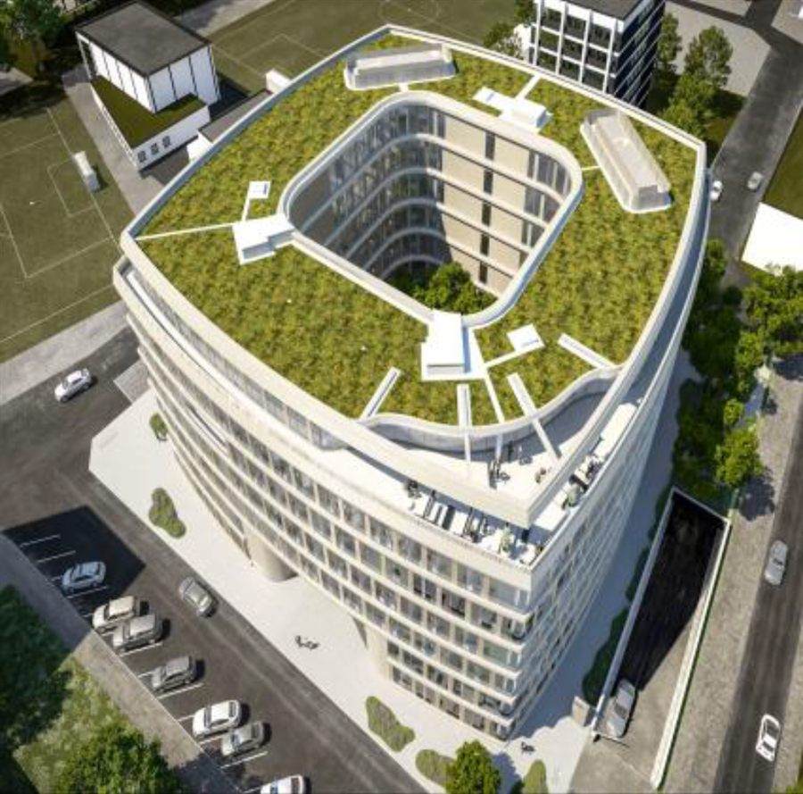 Luftansicht des Gebäudes The Oval in Düsseldorf mit begrüntem Dach und Tiefgarage